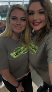Kaitlin Horton, Fair Chance Hiring Pipeline Lead at Aventiv Technologies, smiles alongside a colleague, representing their joint efforts in supporting second-chance hiring initiatives.