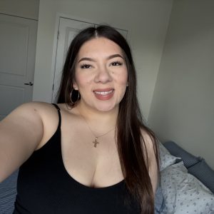Portrait of Annaleah, smiling confidently after building a new career through the Televerde Foundation and McGraw Hill.
